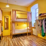 Спальное место на двухъярусной кровати в общем номере для мужчин и женщин в Автор Таганка