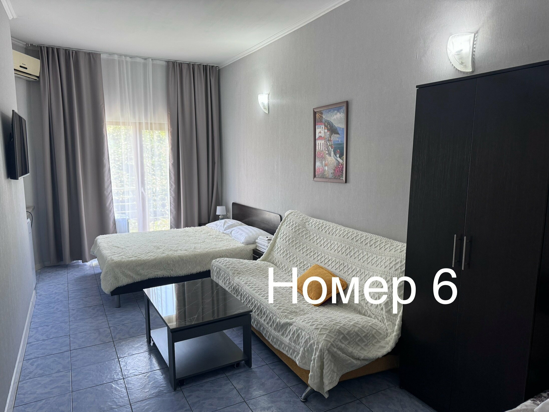 Четырехместный номер с балконом