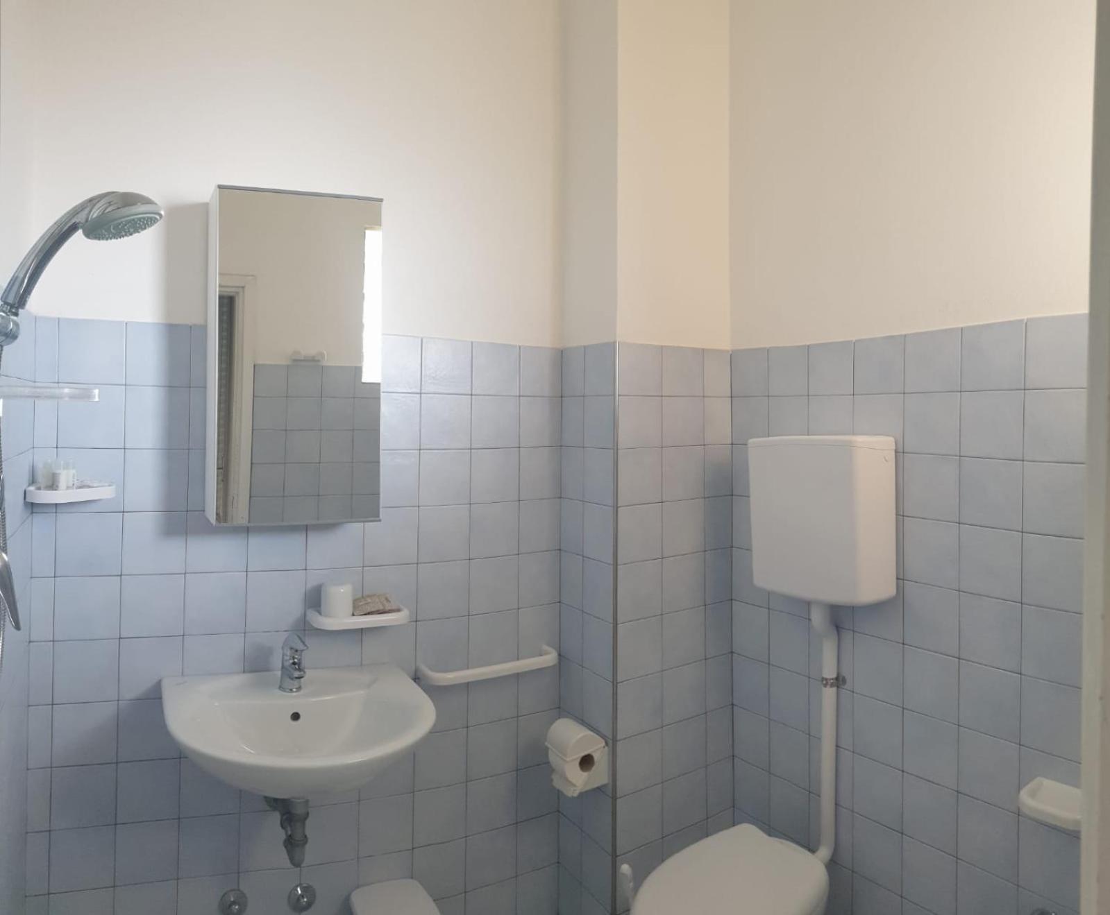 Quadruple Room with Private Bathroom