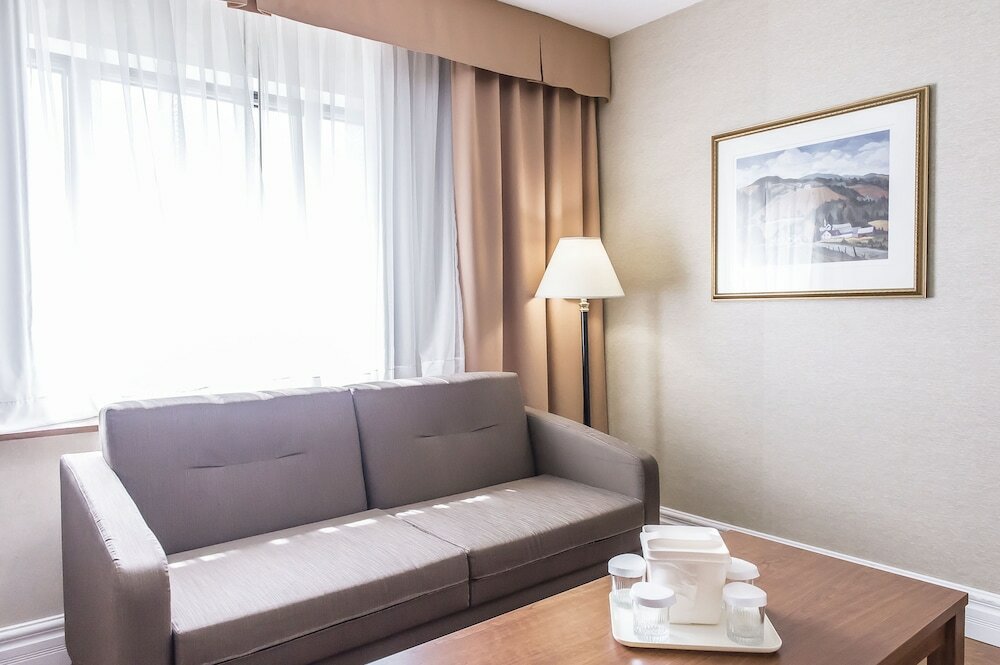 Suite, 1 King Bed with Sofa bed, Non Smoking