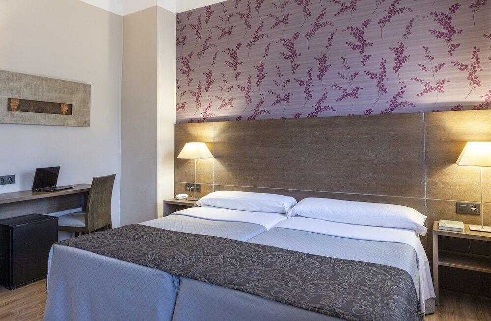 Double Room (with extra bed 2 Adults + 1 Child)