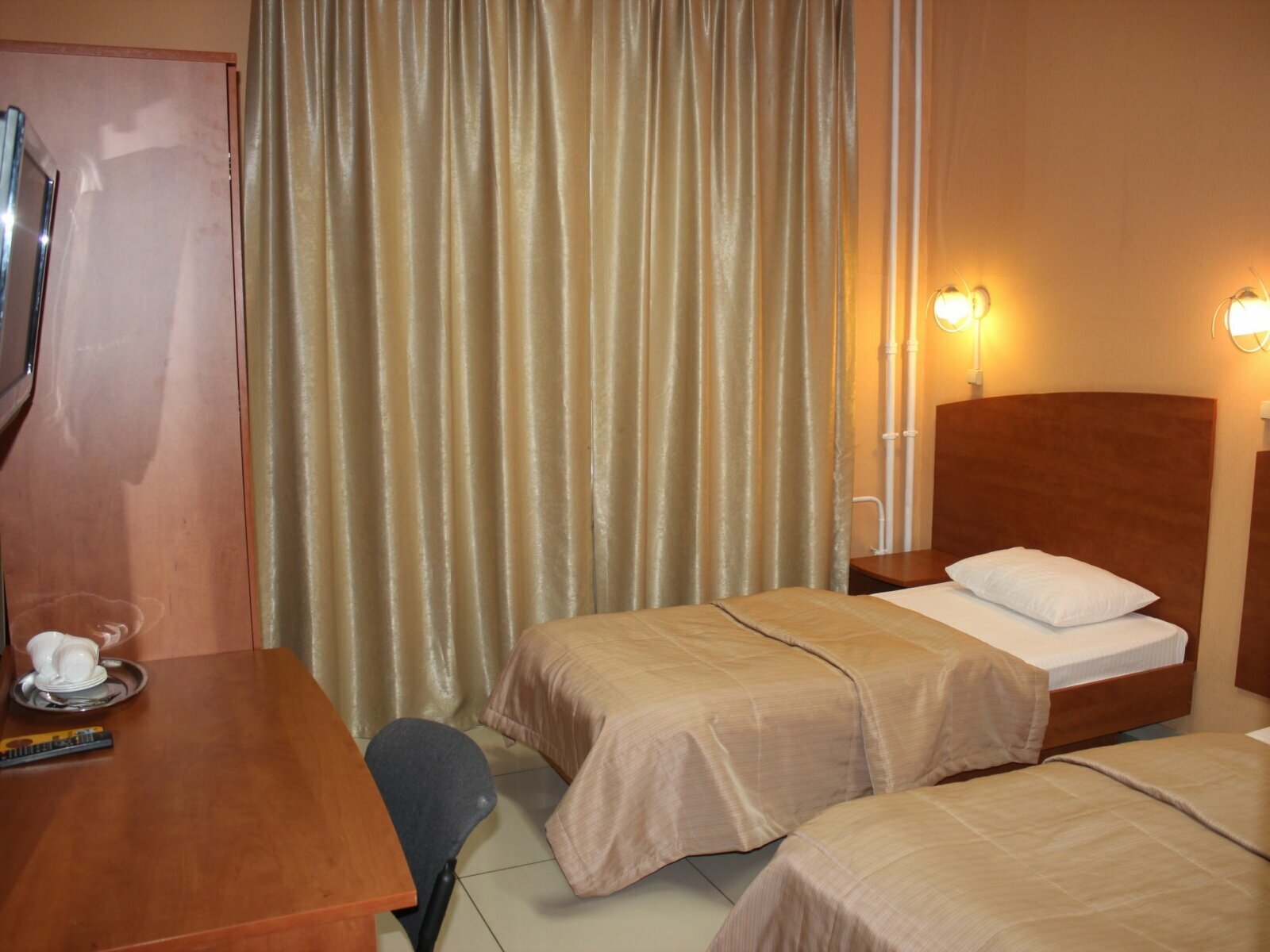 Трехместный номер с общей ванной комнатой