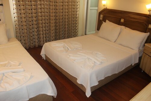 Стандартный четырехместный номер в Hotel Berlin