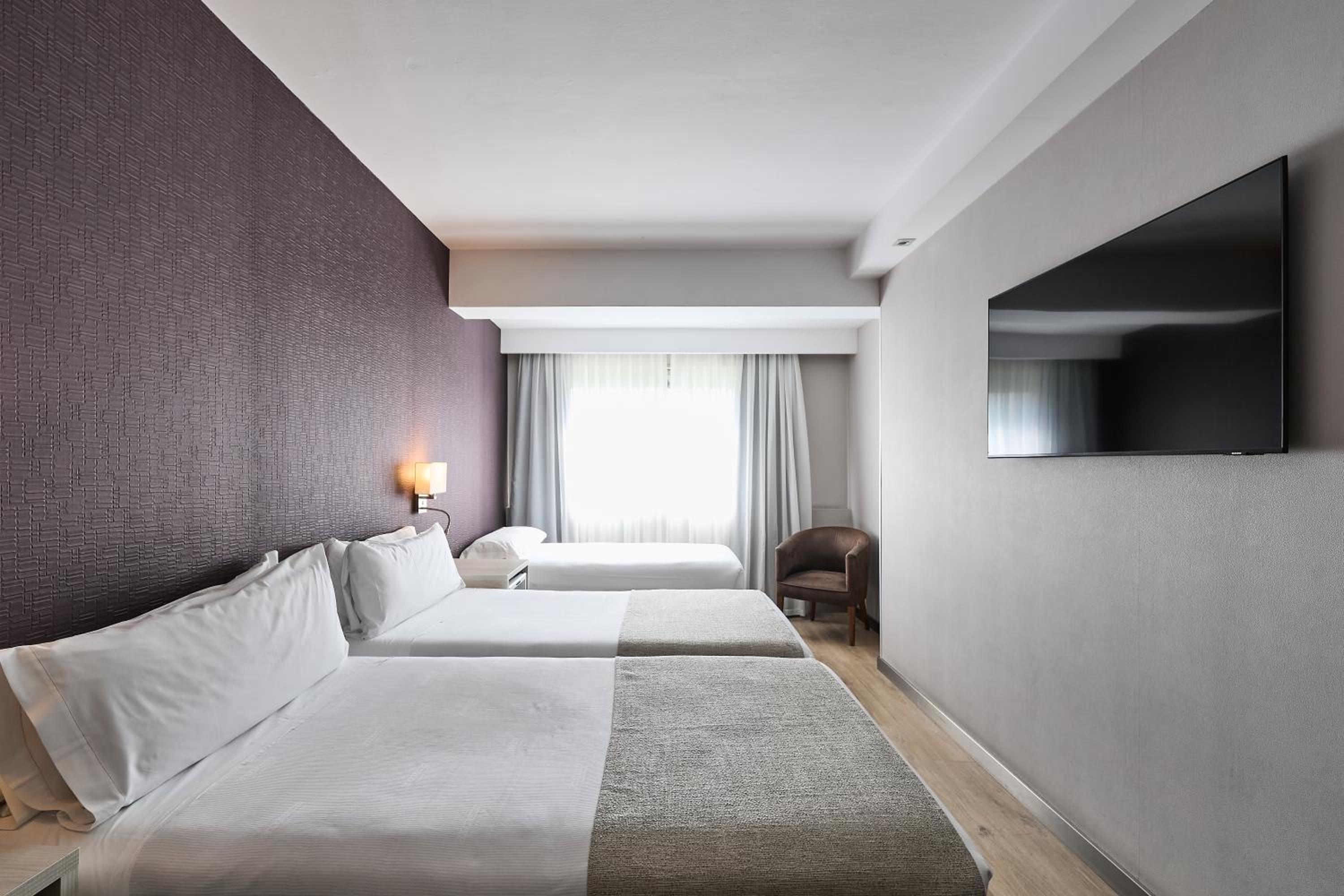 Triple Room (2 Adults + 1 Child)