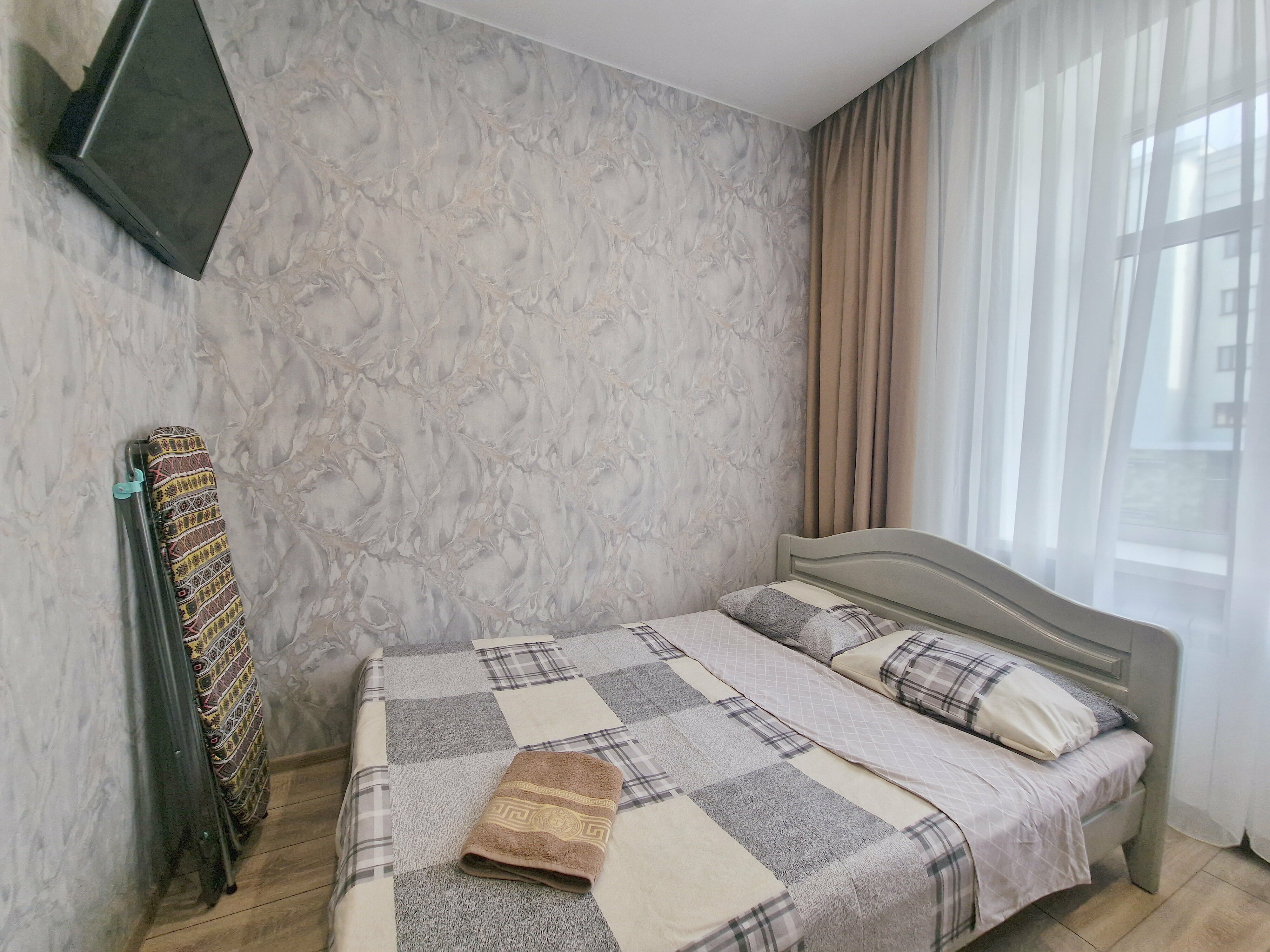 Трехместный номер с собственной ванной комнатой