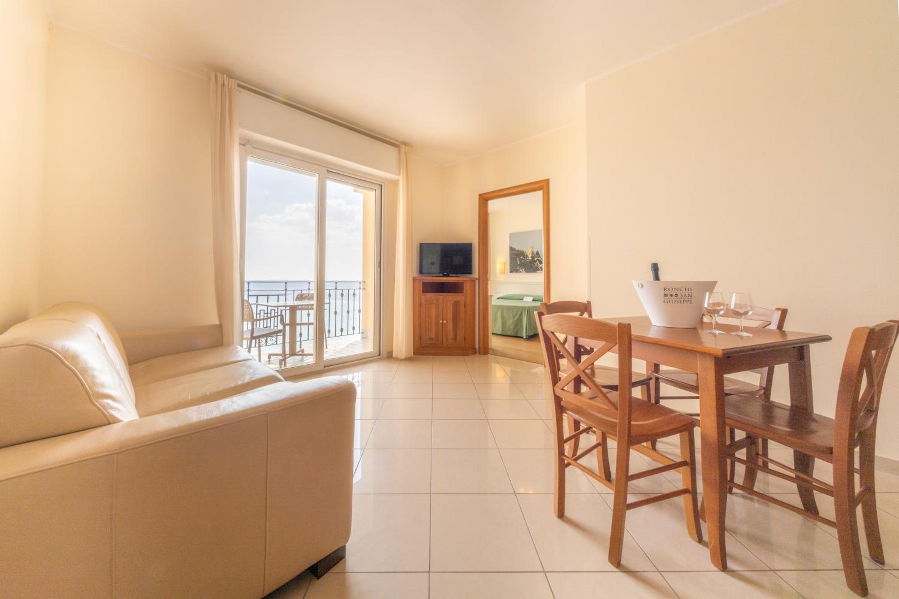 One-Bedroom Apartment with Balcony and Sea View