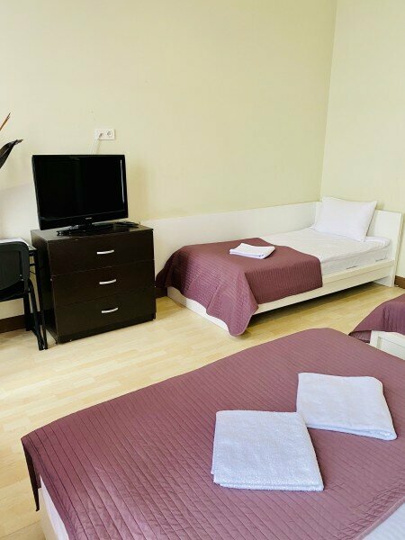 Четырехместный номер с общей ванной комнатой