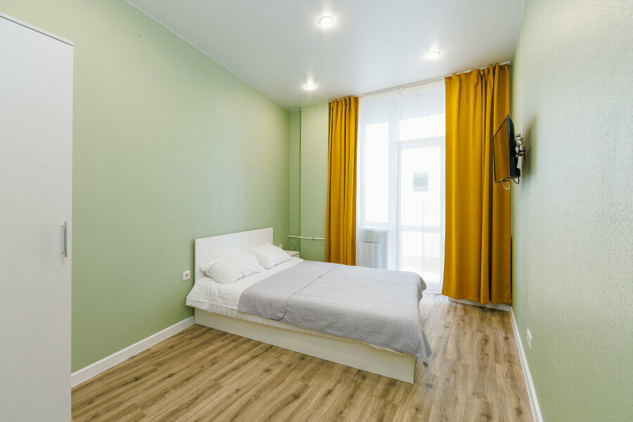 Апартамент с тремя спальнями и кухней-гостиной