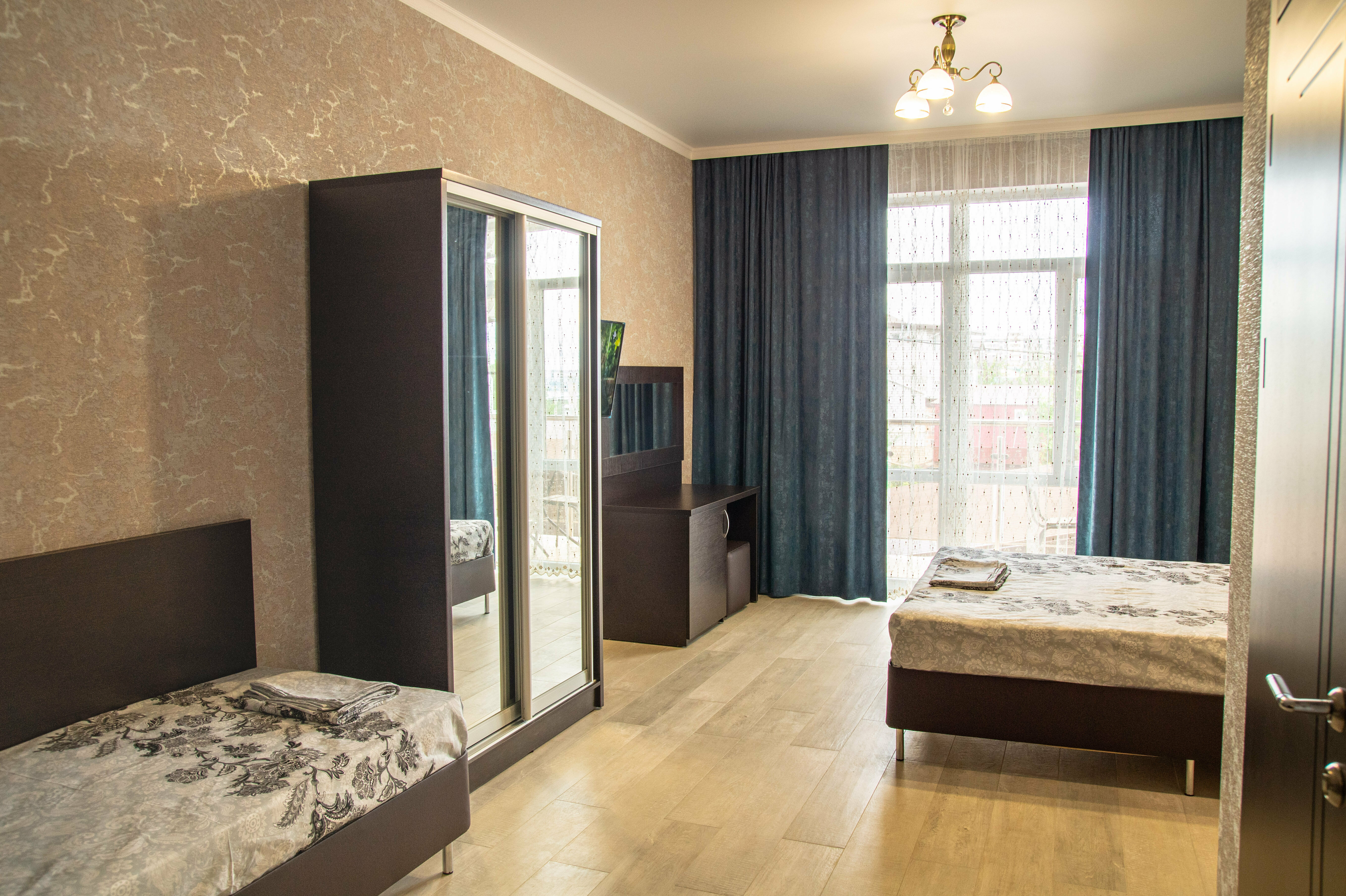 Четырехместный номер с балконом