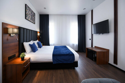 Улучшенный номер с кроватью размера «king-size» или 2 отдельными кроватями