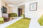 Chambre Prestige Famille (2 adultes et 2 enfants) в Madame Vacances Hotel Le Mottaret