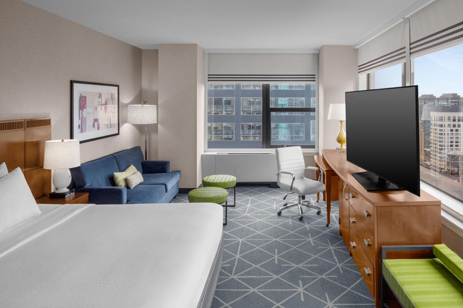 Deluxe Large King Room with Sofa Bed - Mobility and Hearing Accessible with Roll-in Shower