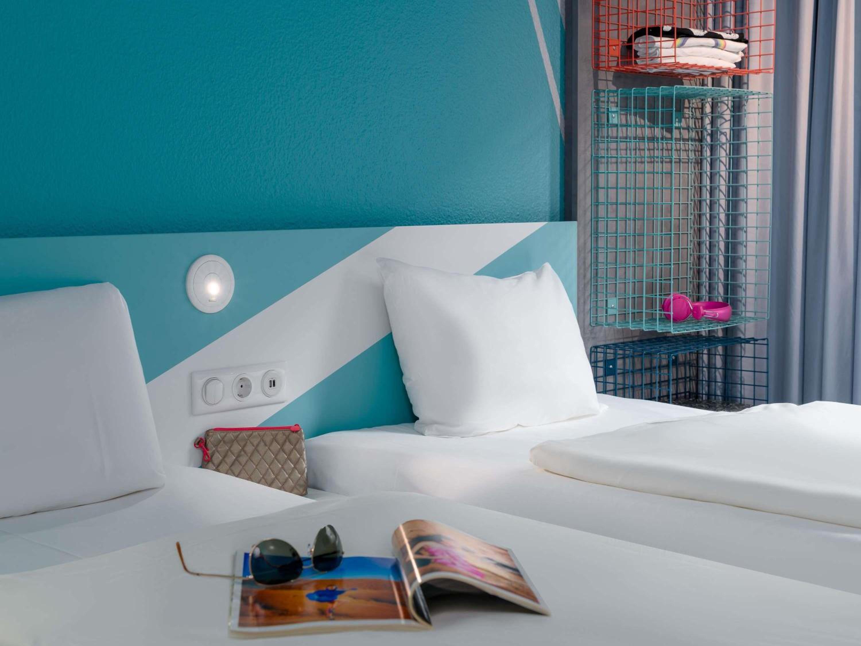 Small twin room with private bathroom and toilet