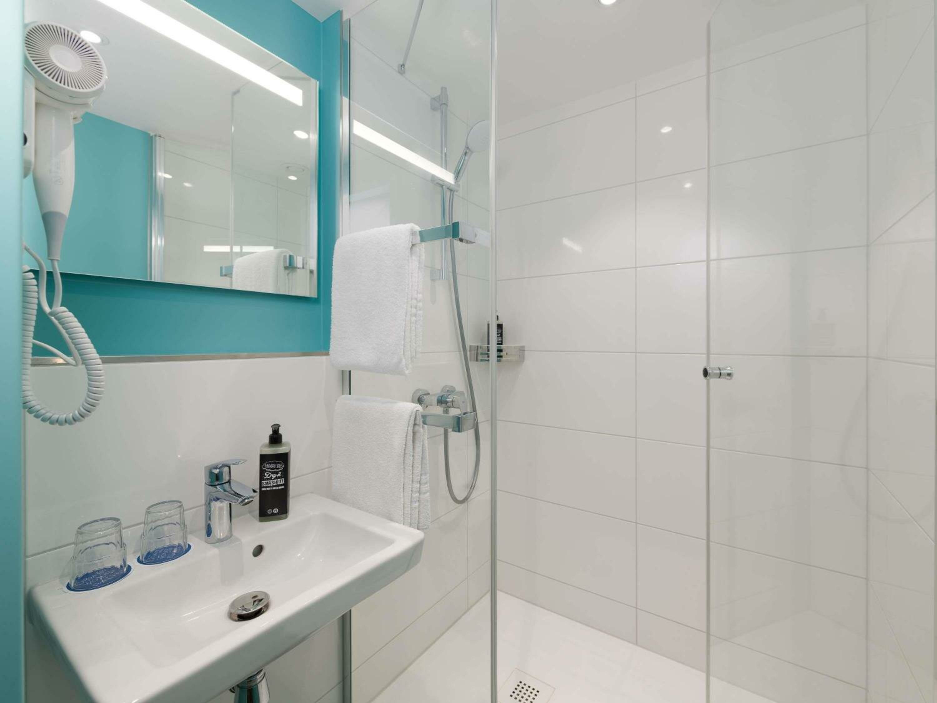 Small twin room with private bathroom and toilet