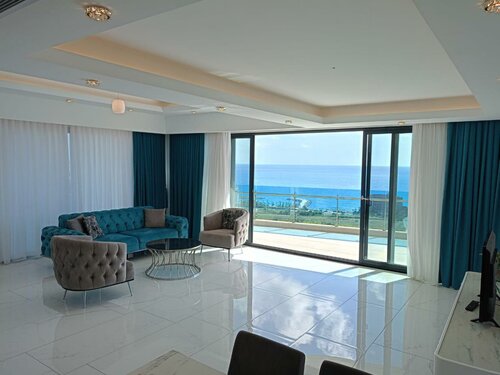 Three-Bedroom Apartment with Sea View в Elite Luxury Suite