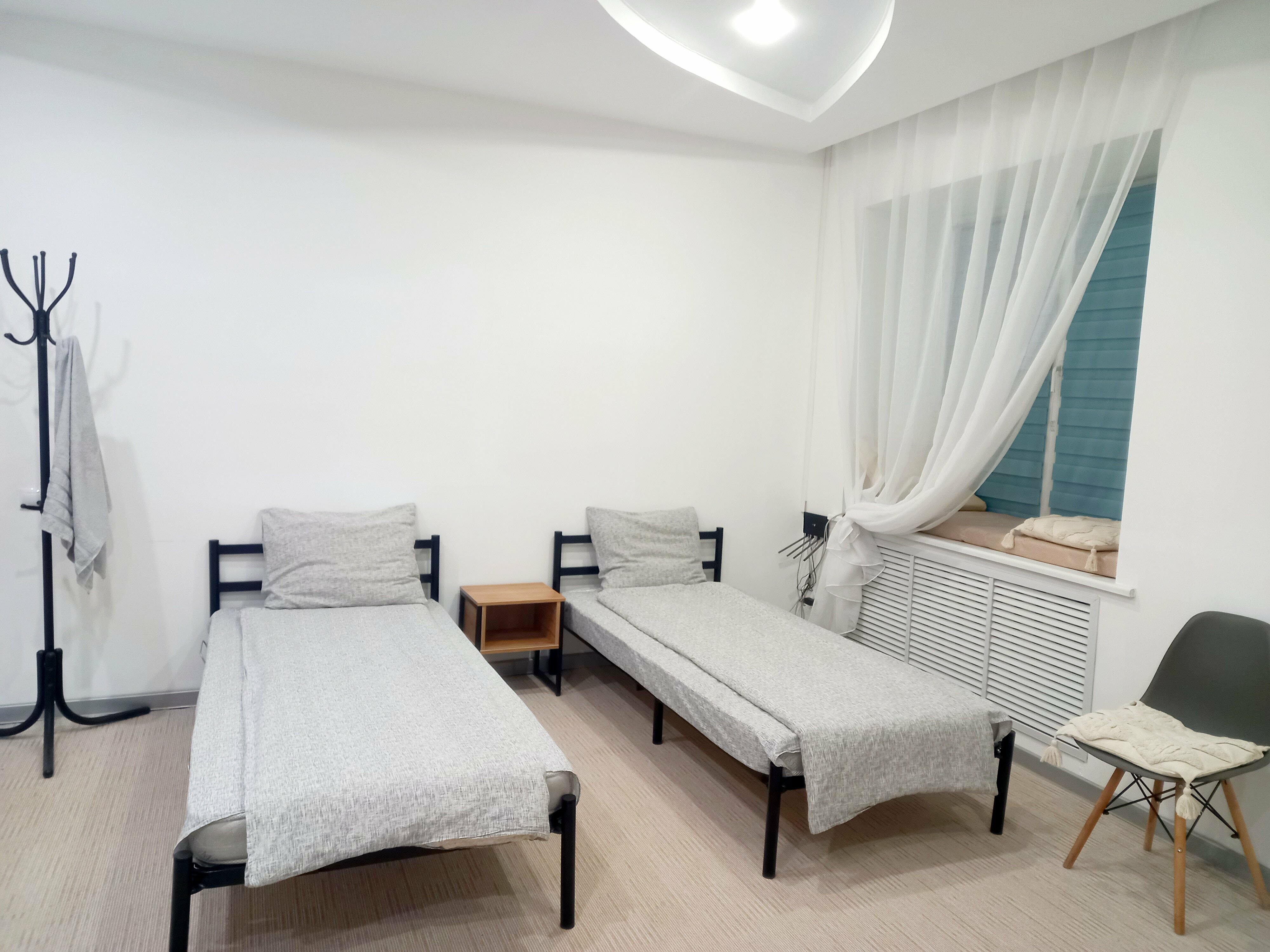 Студия вместимостью до 4 человек с односпальными кроватями