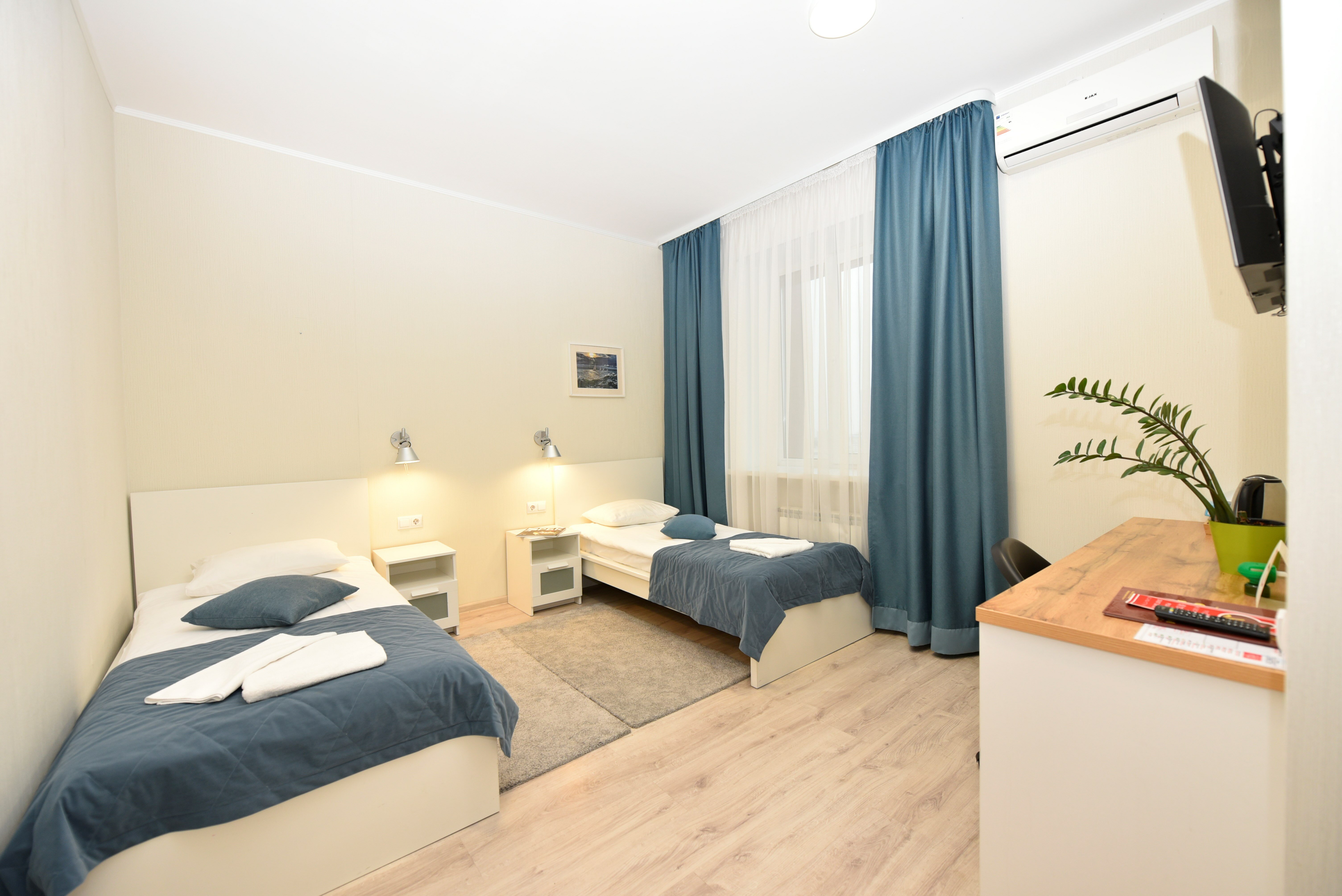 Улучшенный двухместный номер с 2 отдельными кроватями