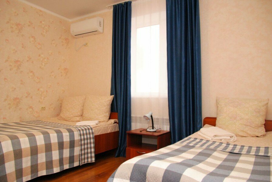 Улучшенный двухместный номер с 2 отдельными кроватями