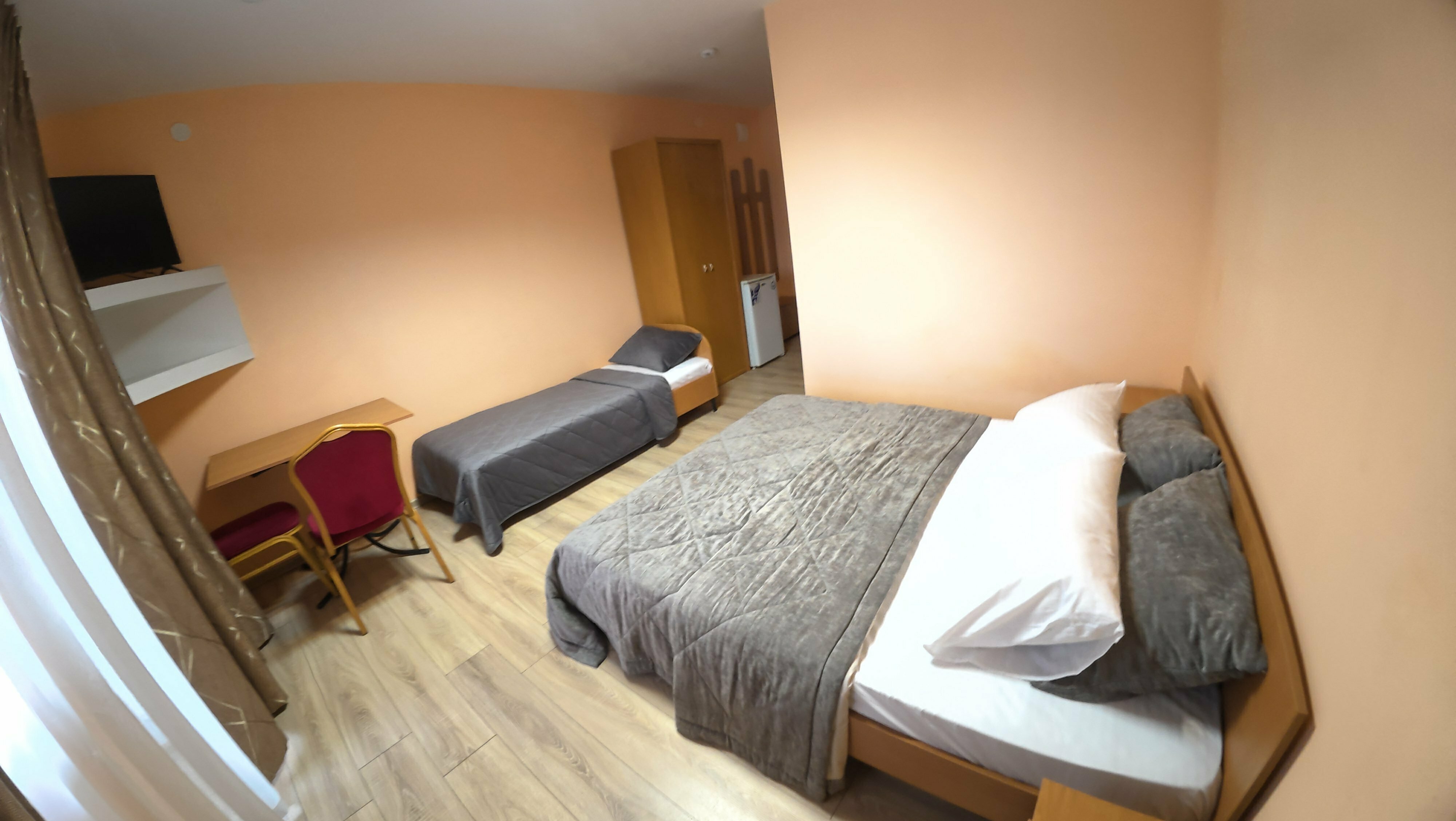 Улучшенный трехместный номер