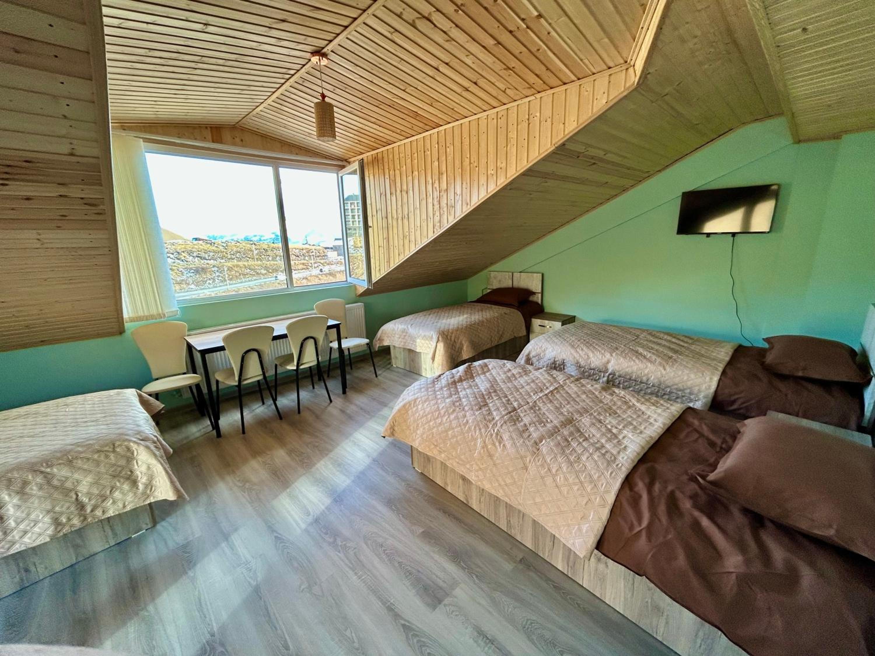 Quadruple Room with Balcony