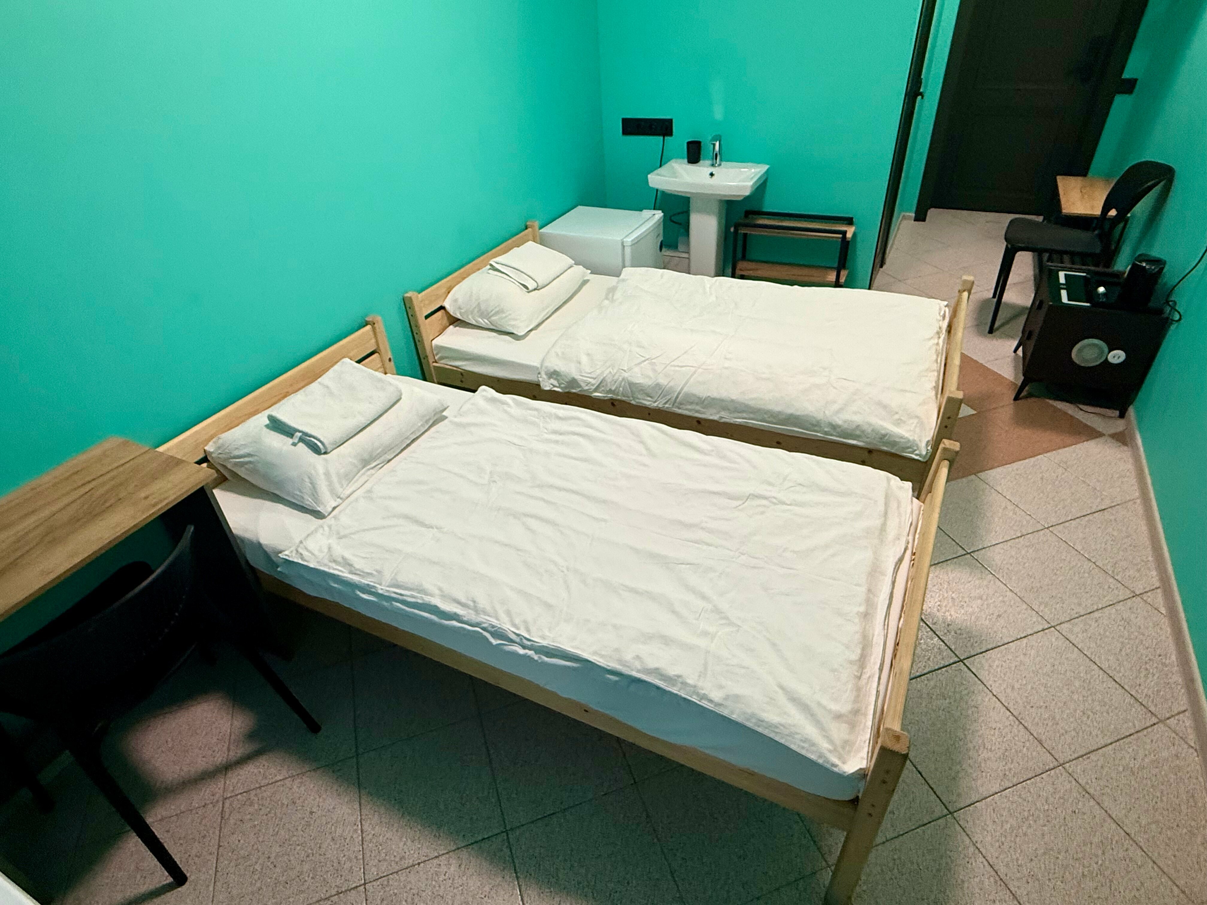 Двухместный номер с 2 отдельными кроватями и душем