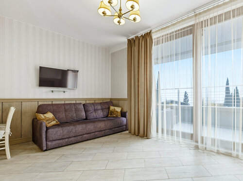 24 А Студия с балконом  видом на бассейн в Фамилия Делюкс