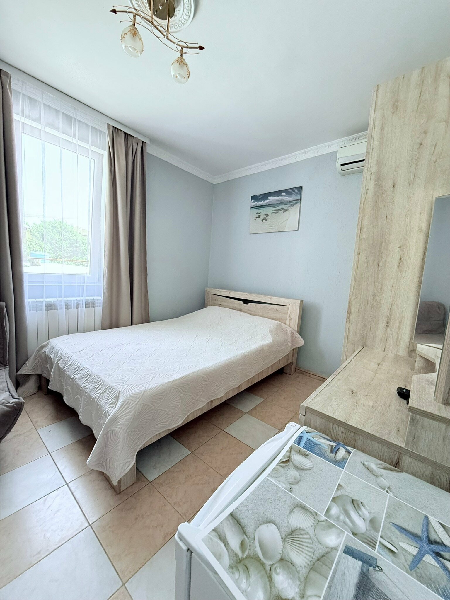 Улучшенный четырехместный номер