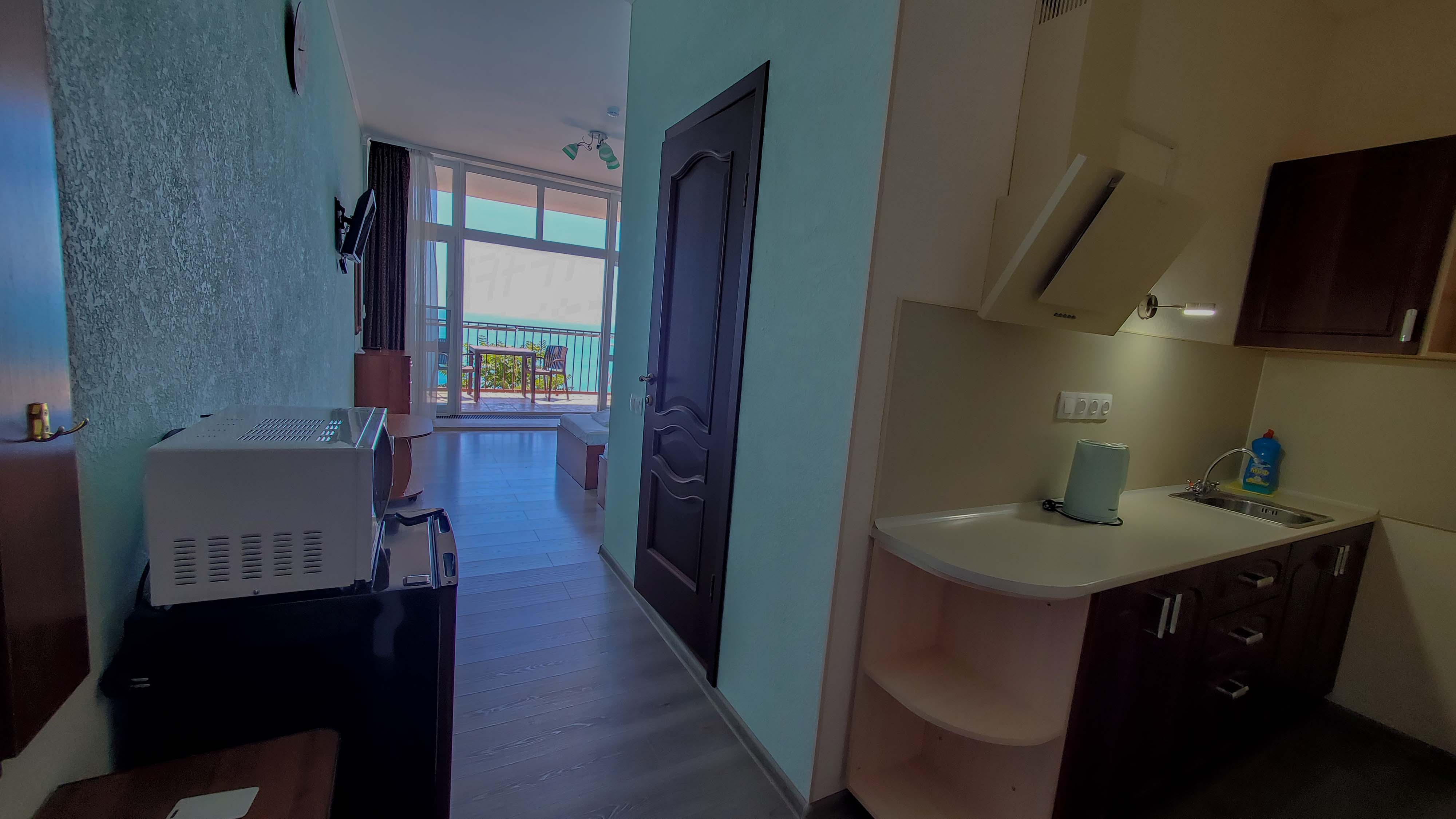 Двухместный однокомнатный люкс с кухней и видом на море