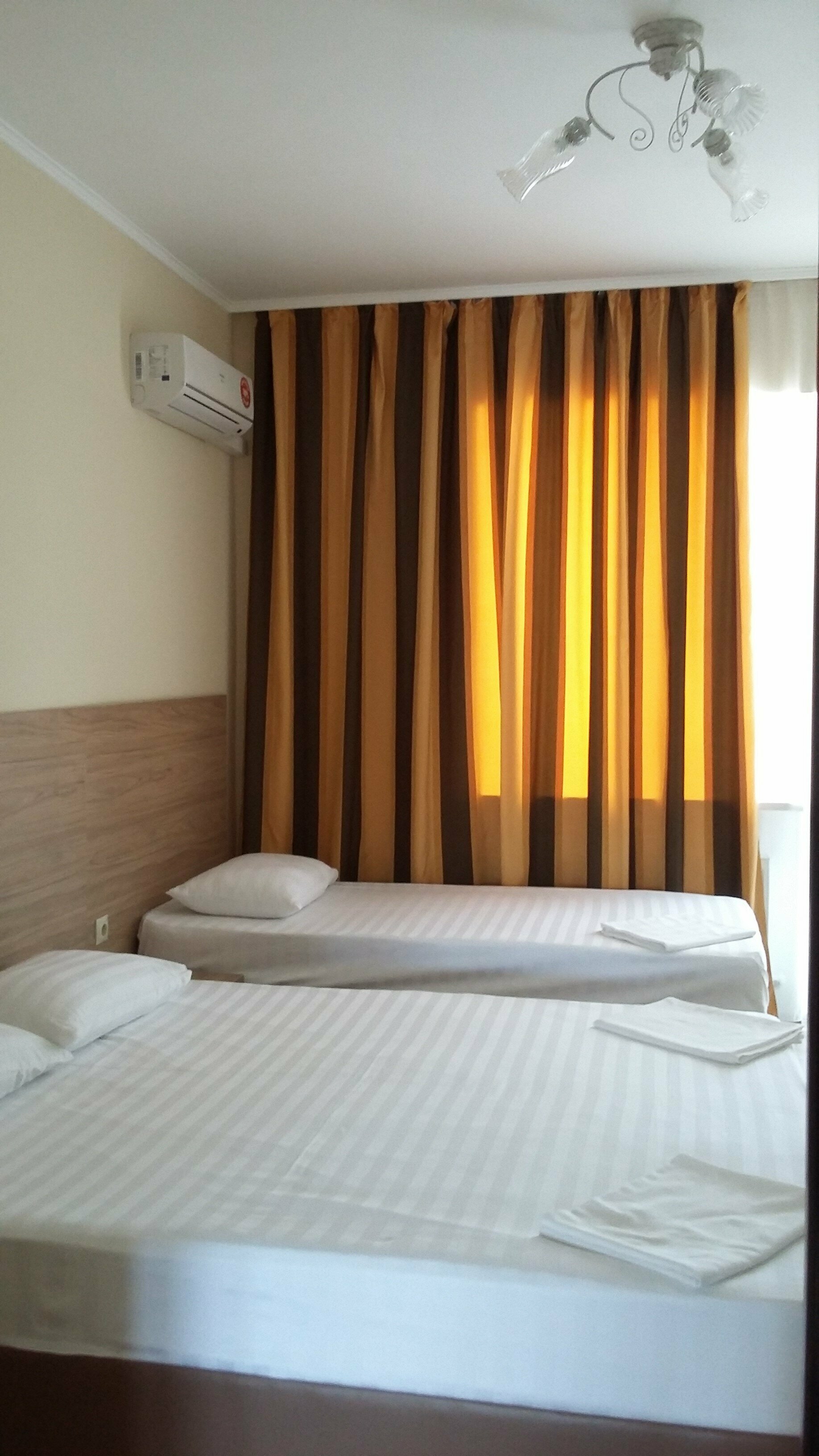 Трехместный номер с балконом