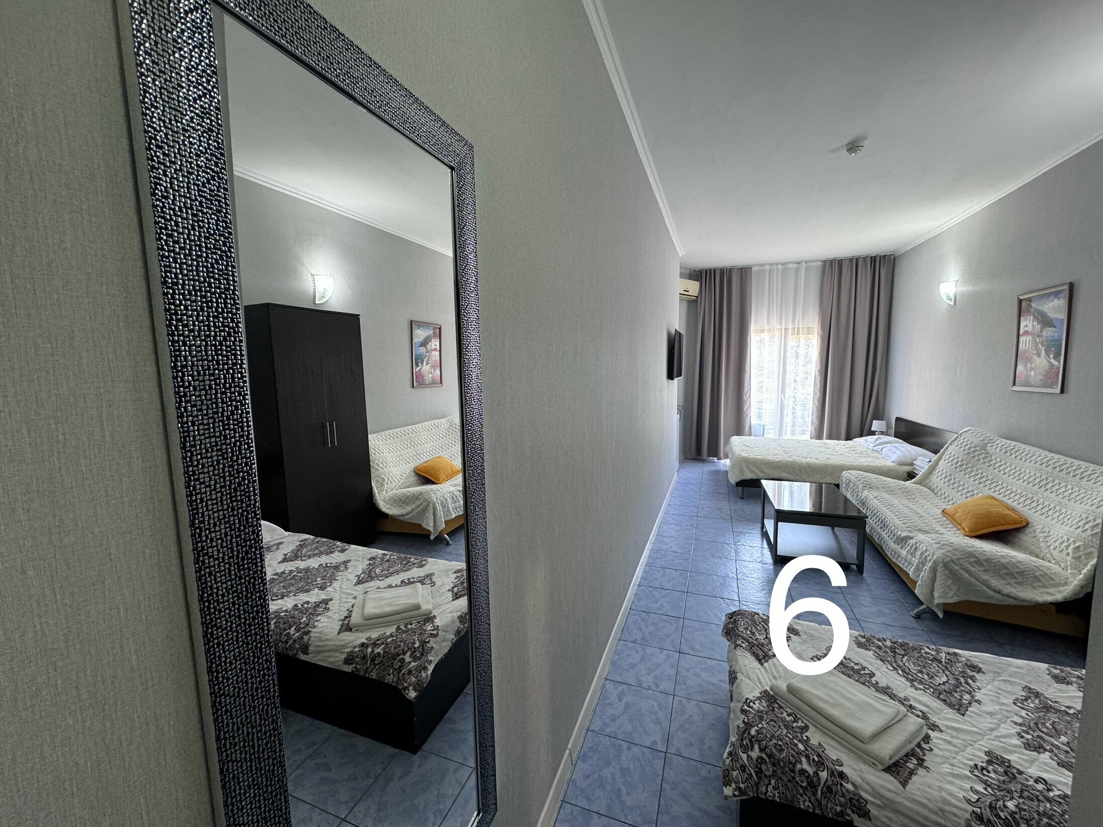 Четырехместный номер с балконом