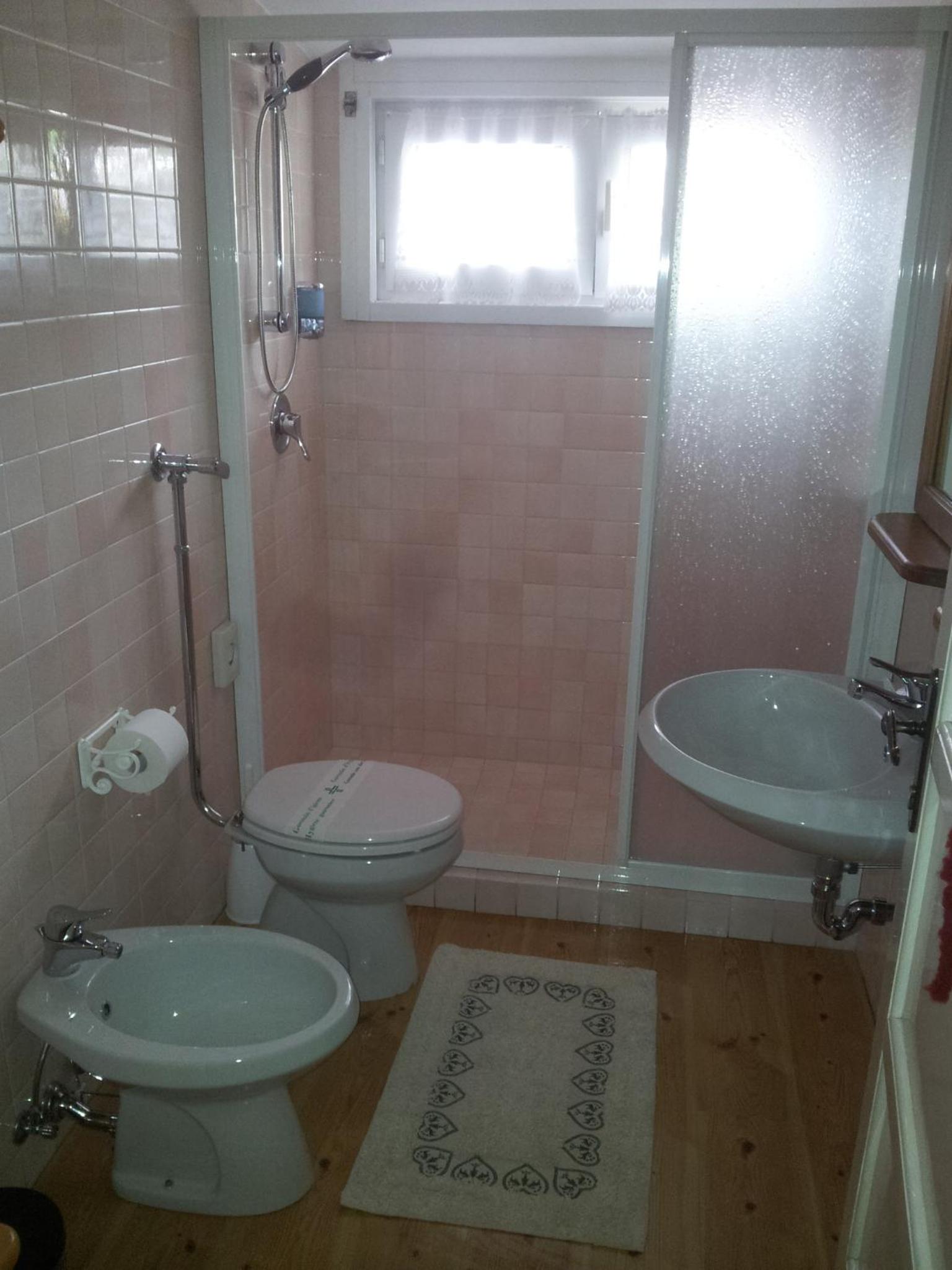 Two Adjacent Rooms with Private External Bathroom (4 Adults)