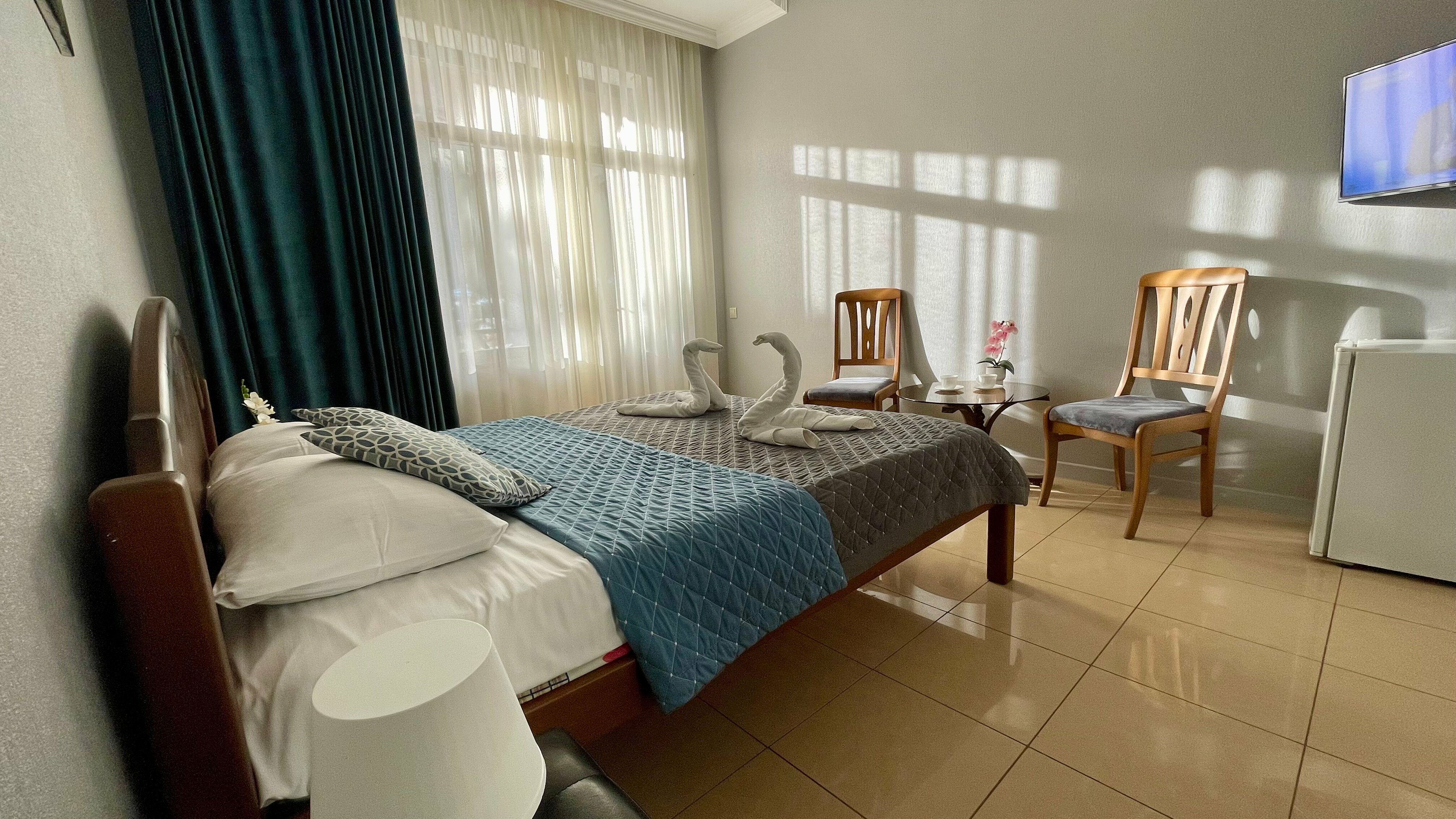 Трехместный номер с балконом