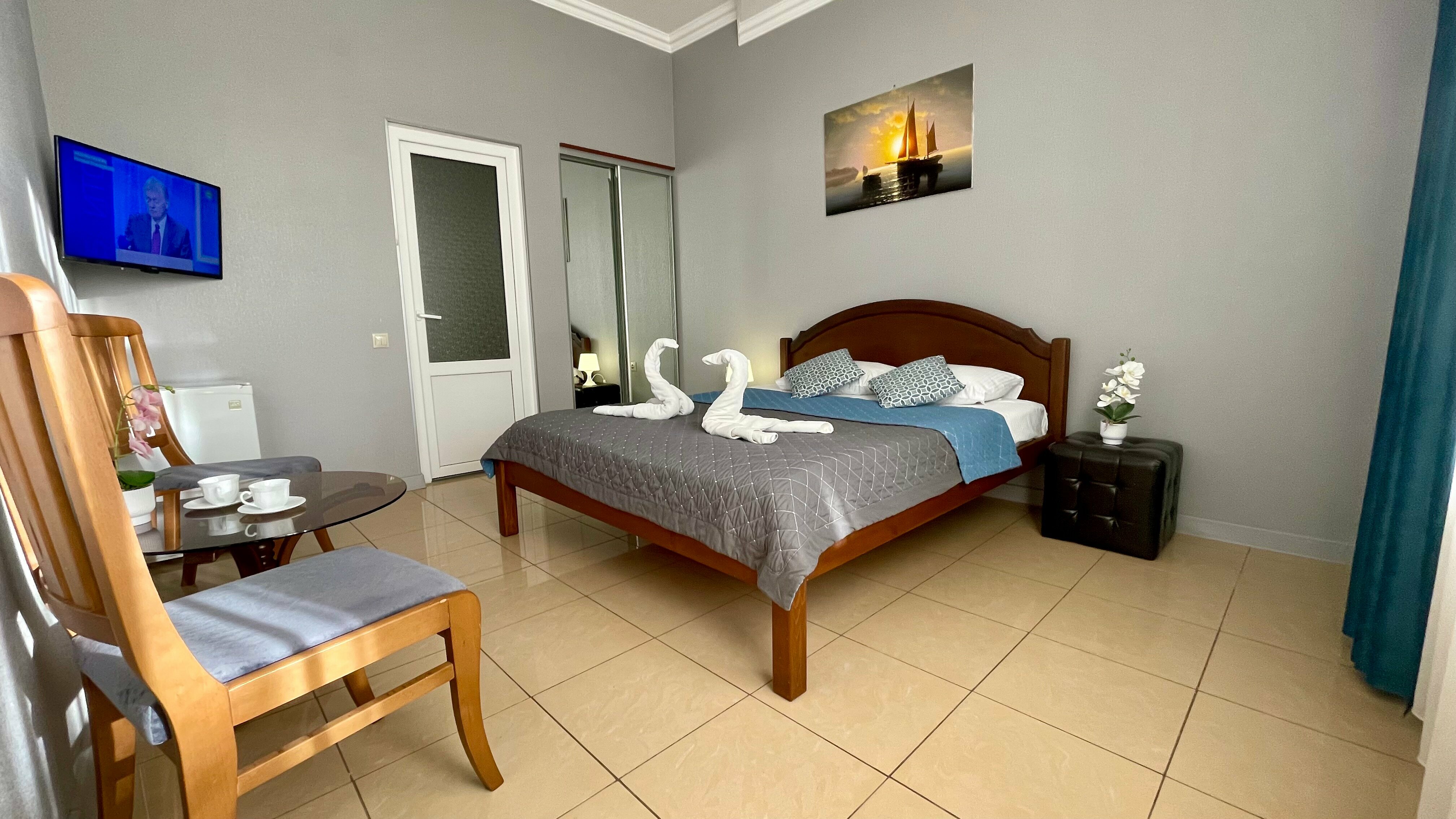 Трехместный номер с балконом