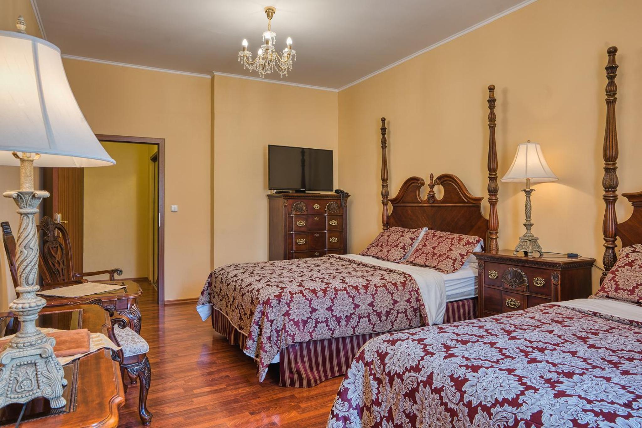 Deluxe Quadruple Room with Two Queen Beds