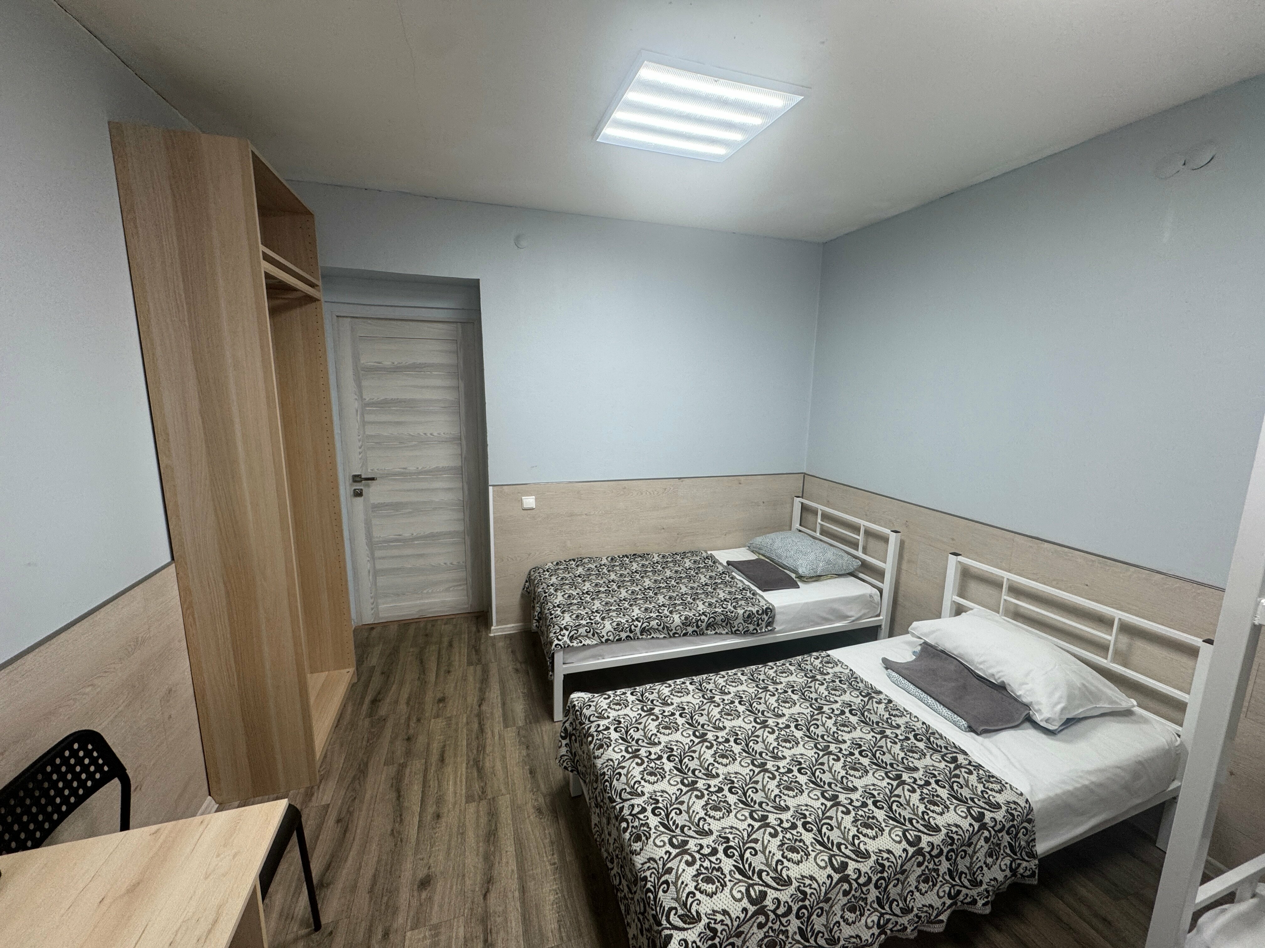 Четырехместный номер с общей ванной комнатой