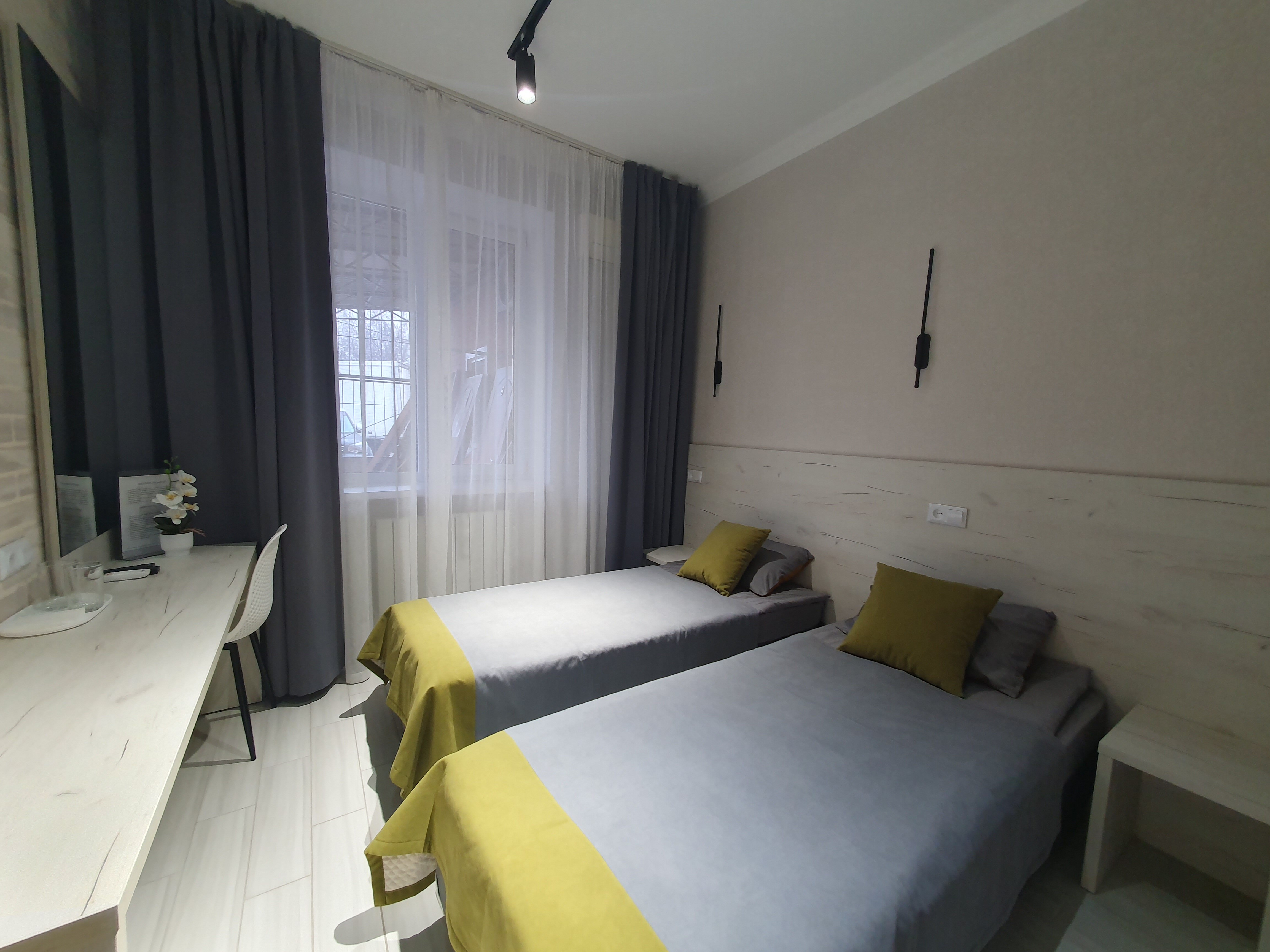 Улучшенный двухместный номер с 2 отдельными кроватями