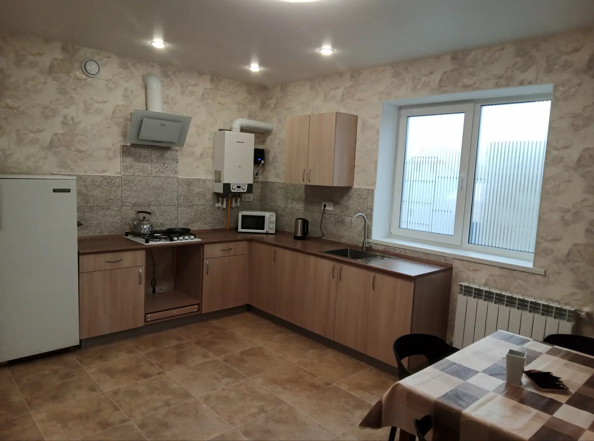 Спальное место на двухъярусной кровати в общем номере для мужчин и женщин