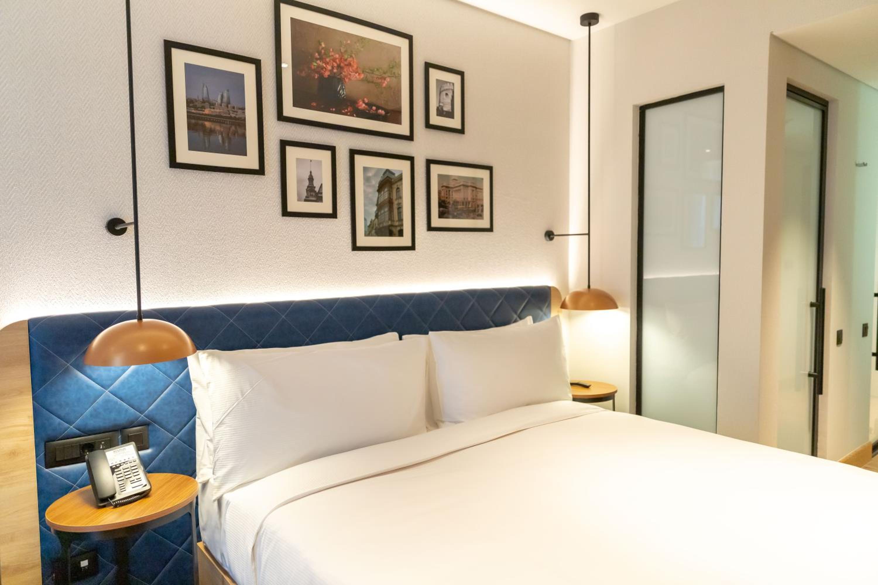 King Room with Sofa Bed - Atrium View