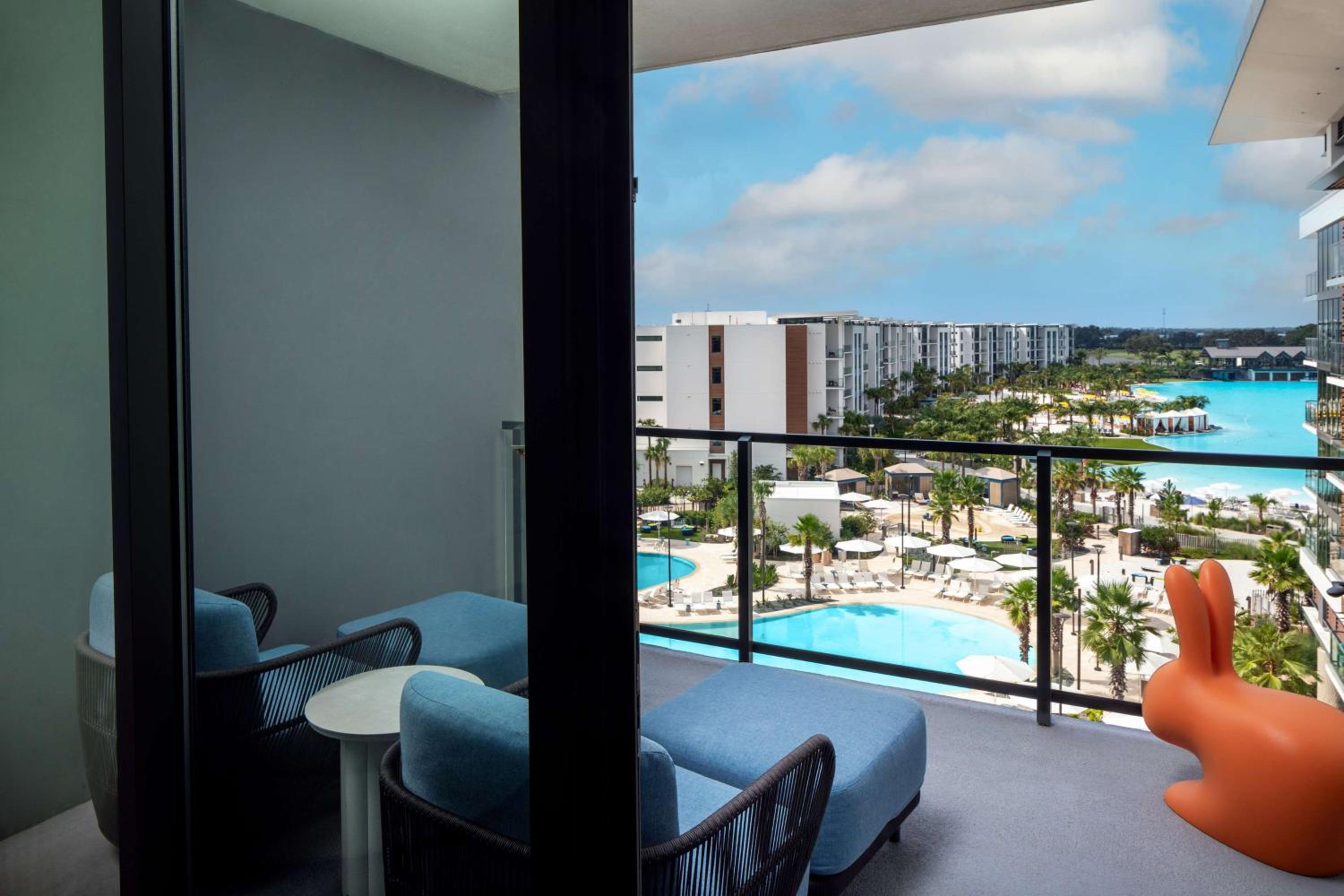 One-Bedroom Suite with Balcony and Pool View
