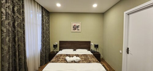 Family Quadruple Room, Balcony (302) в Hotel Boutique Iveria