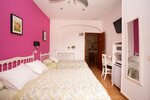 Семейный трехместный номер в Hostal Los Alpes