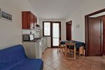 Appartamento Standard con Patio в Il Melo Residence