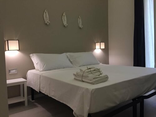 Двухместный номер с 1 двуспальной кроватью, балкон (Rubino) (2 pax) в Bed & x26; Breakfast Gatto Bianco