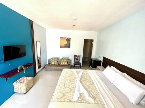 Улучшенный двухместный номер с 1 двуспальной кроватью в Little Rock Cebu