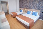 Standard Triple Room Non-Balcony в Alder Garden Hotel