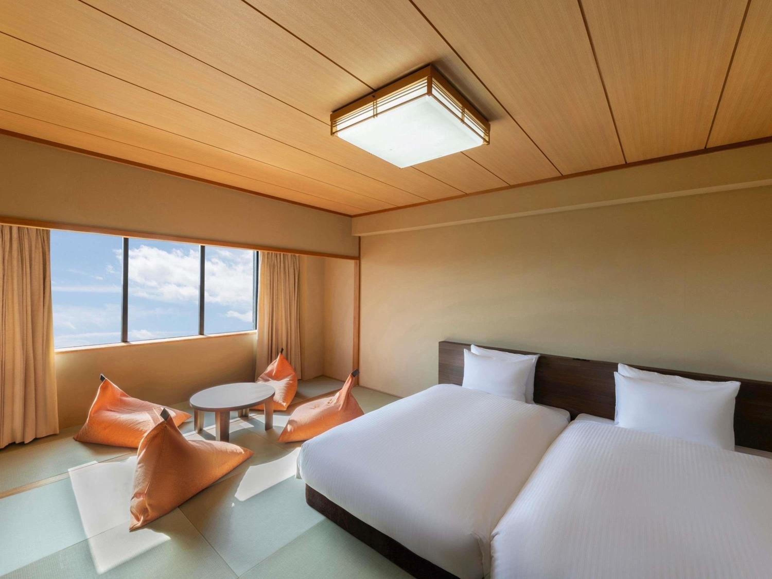 Family Japanese-Style Room with Two Single Beds and Three Futons
