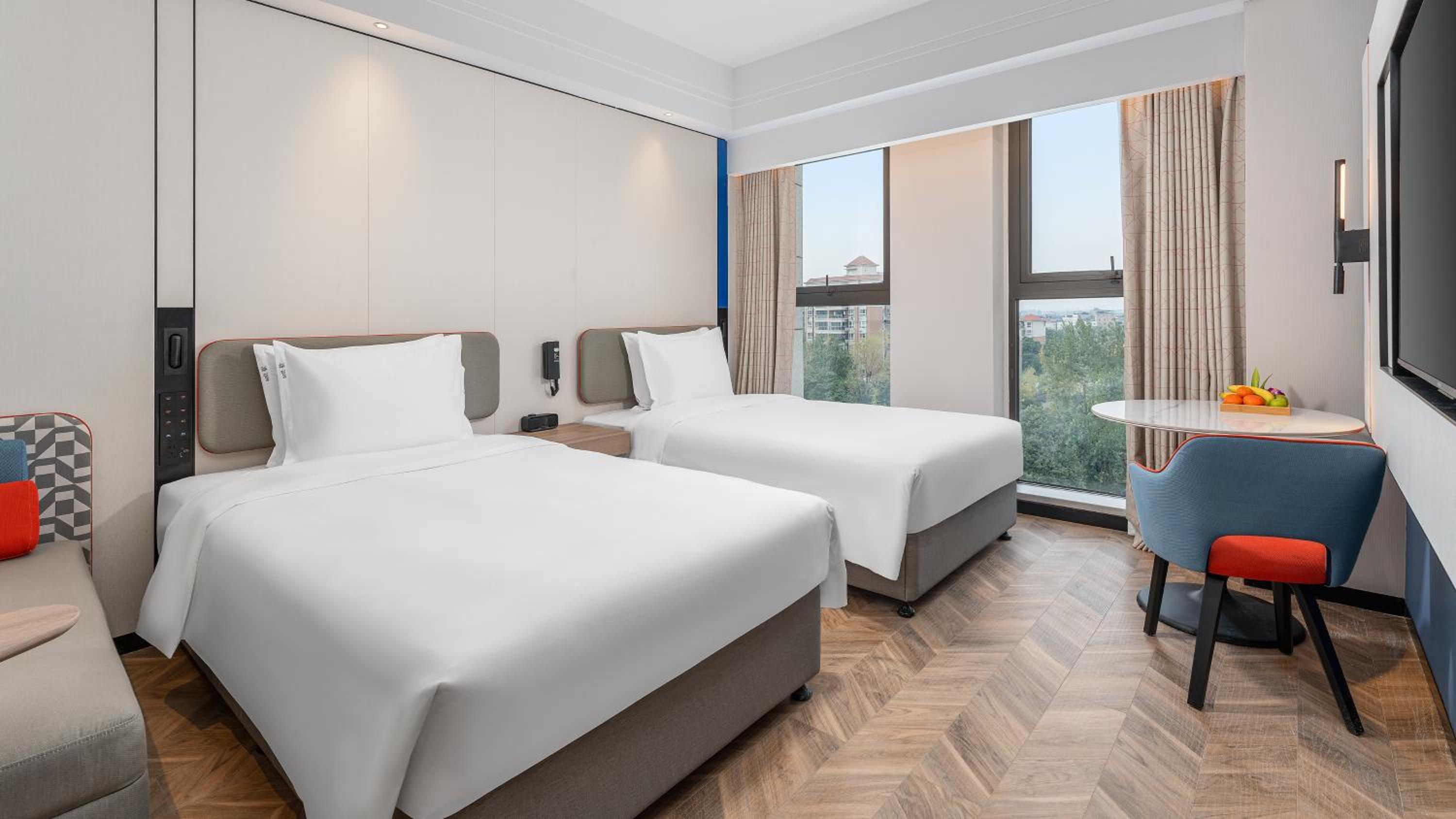 Standard Room with One King and Two Double Beds
