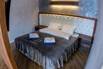 Номер-студия с кроватью размера "king-size" и диван-кроватью в АкваТермо