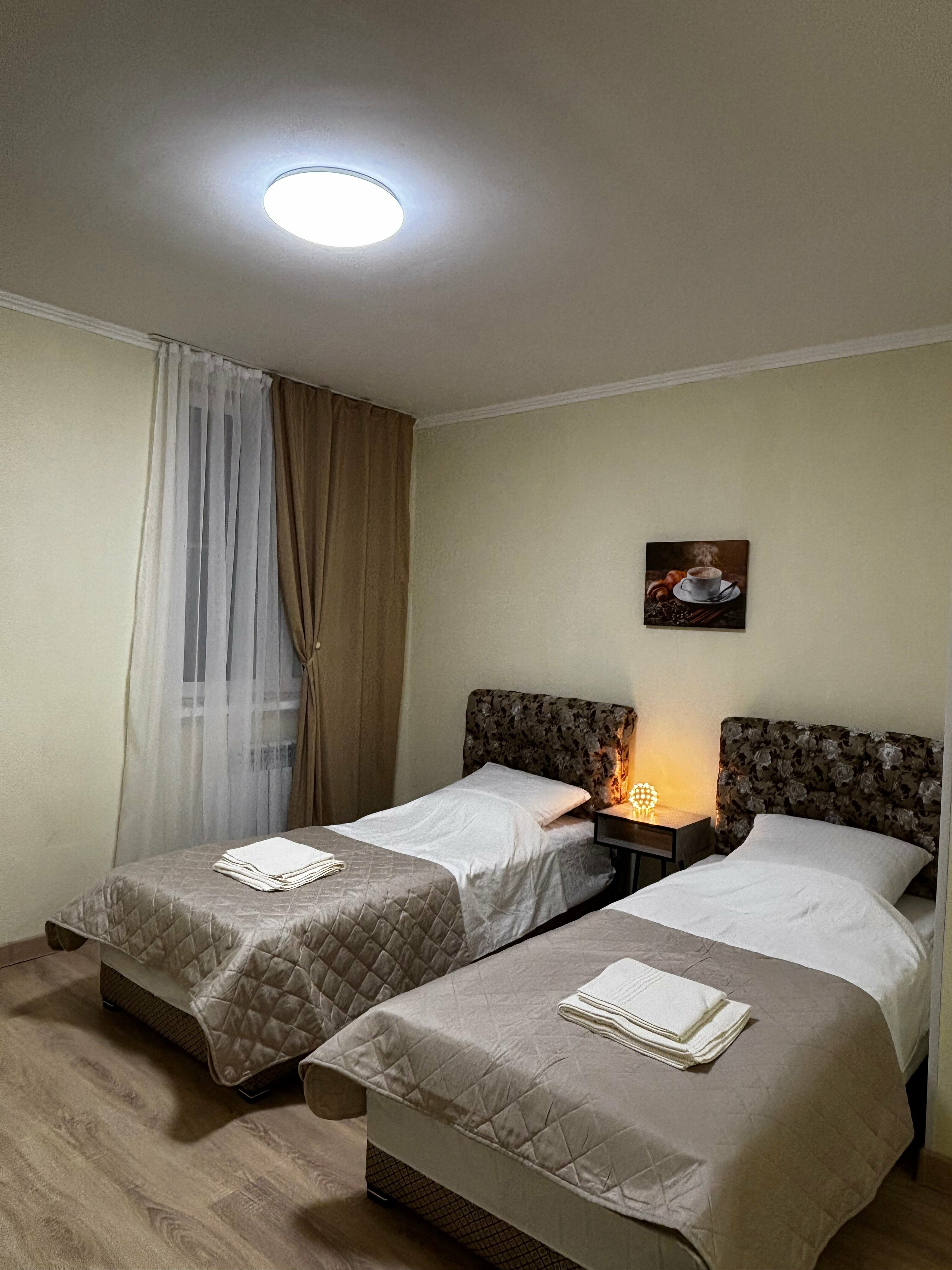 Просторный двухместный номер с 2 отдельными кроватями