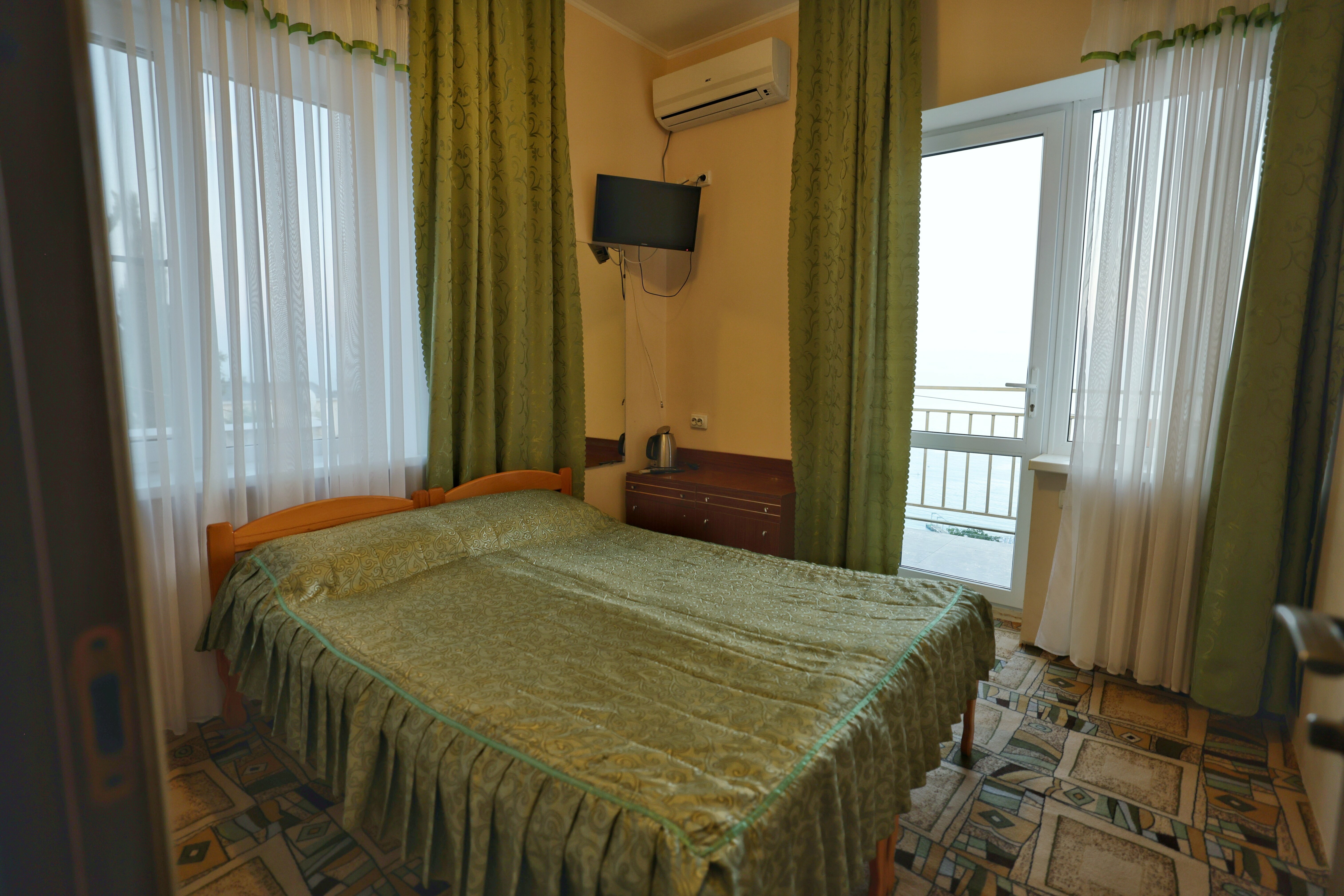 Двухместный номер с балконом и видом на море